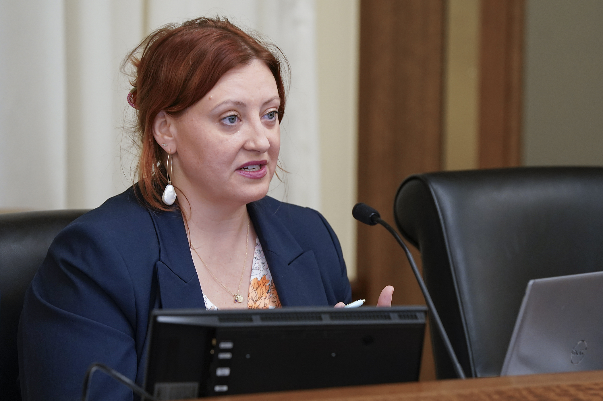 Kristy Graume, director of state government relations at the Department of Human Services, shares the department’s program integrity efforts with the House Human Services Finance and Policy Committee Feb. 19. (Photo by Michele Jokinen)
